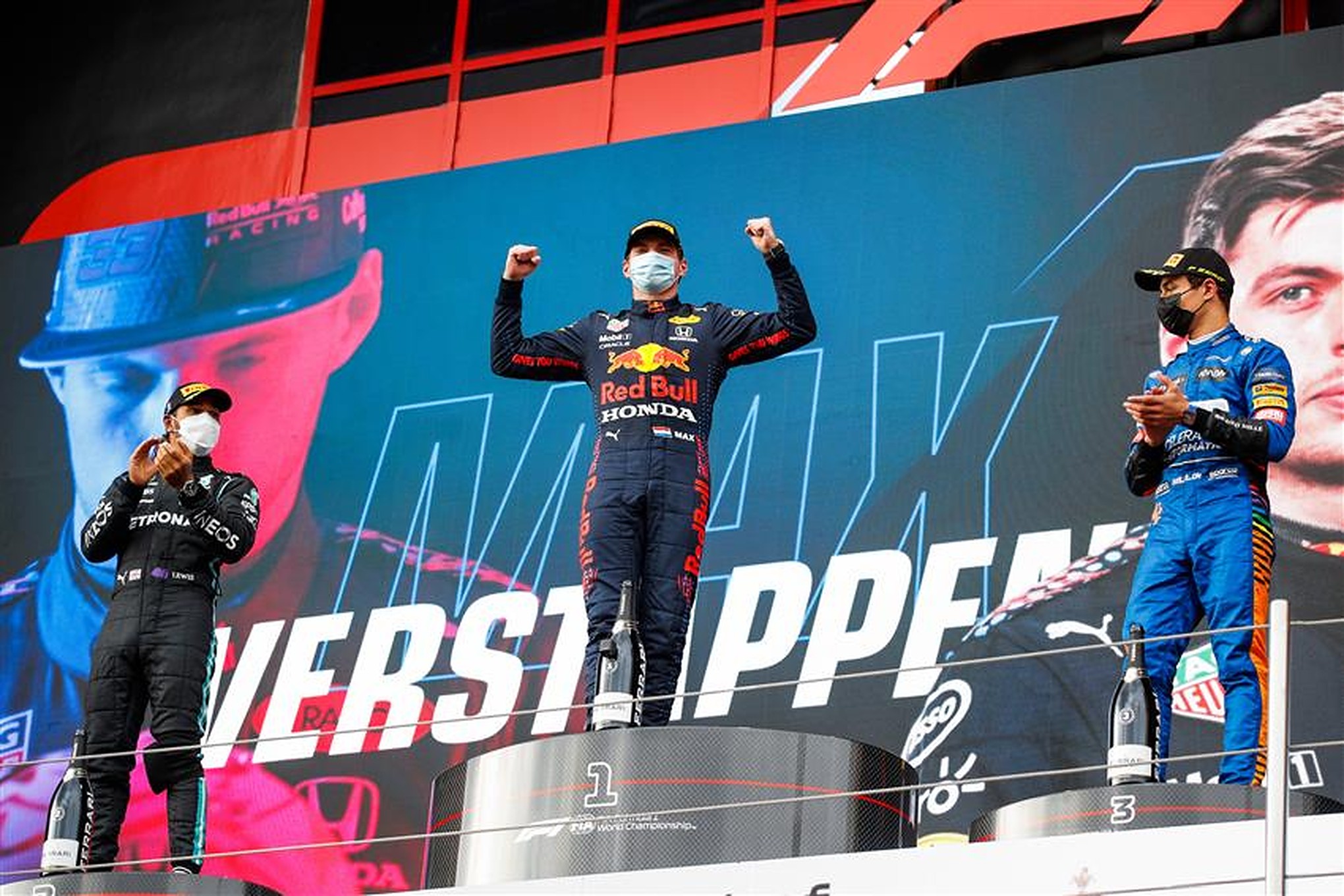 Max Verstappen and Lewis Hamilton on the podium at Imola - Formula1news.co.uk