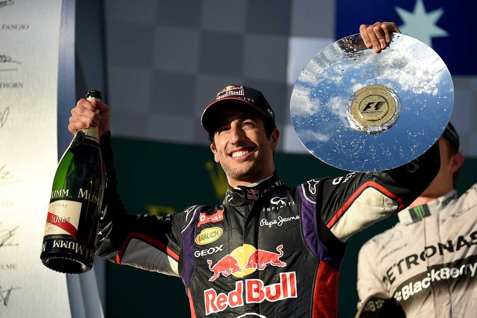 Daniel Ricciardo on the podium in 2014 - Formula1news.co.uk.v1