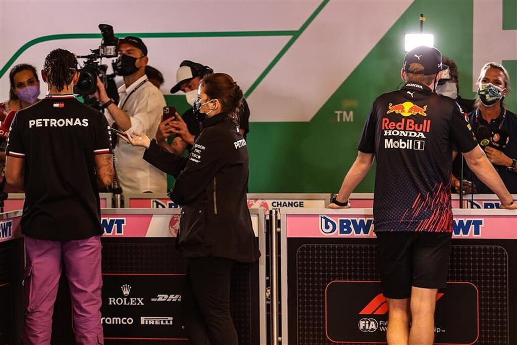 Lewis Hamilton and Max Verstappen after the 2021 Abu Dhabi GP.v1