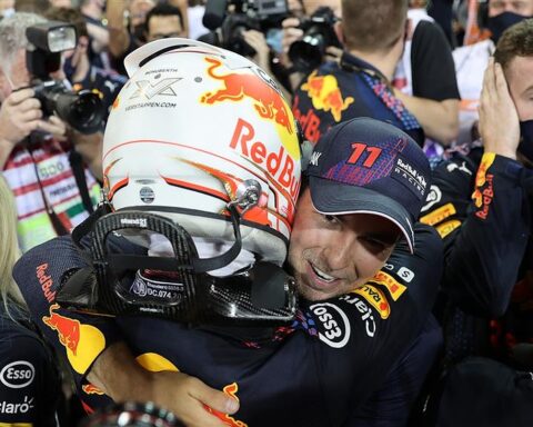 Sergio Perez celebrates with Max Verstappen in Abu Dhabi.v1